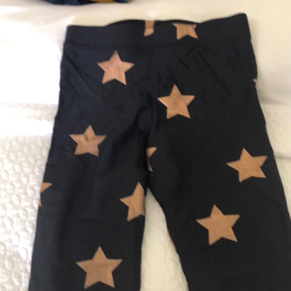 Terez black shiny legging with gold stars